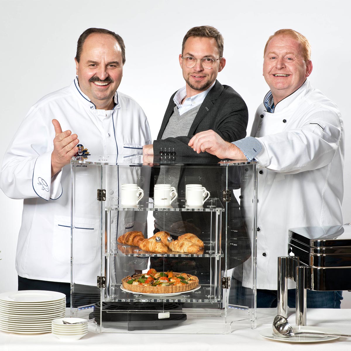 Johann Lafer und Caterers friend Chef Dietrich Lampe mit Alexander Bittner